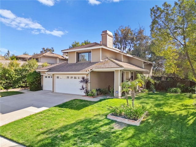 view of front of property with concrete driveway, a chimney, a front yard, and fence