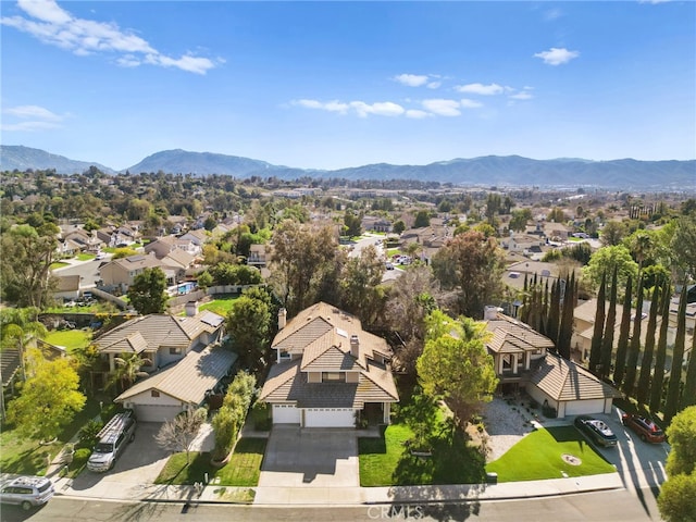 drone / aerial view featuring a mountain view and a residential view