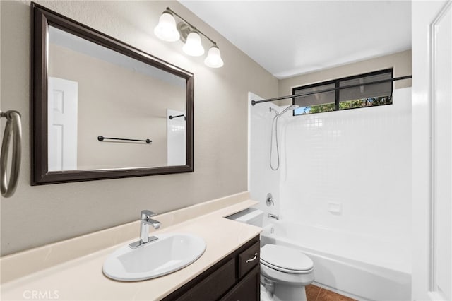 full bathroom with tub / shower combination, vanity, and toilet