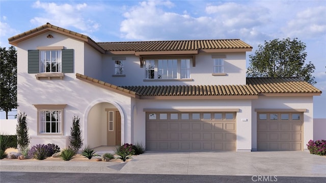 mediterranean / spanish home featuring a tile roof, driveway, an attached garage, and stucco siding