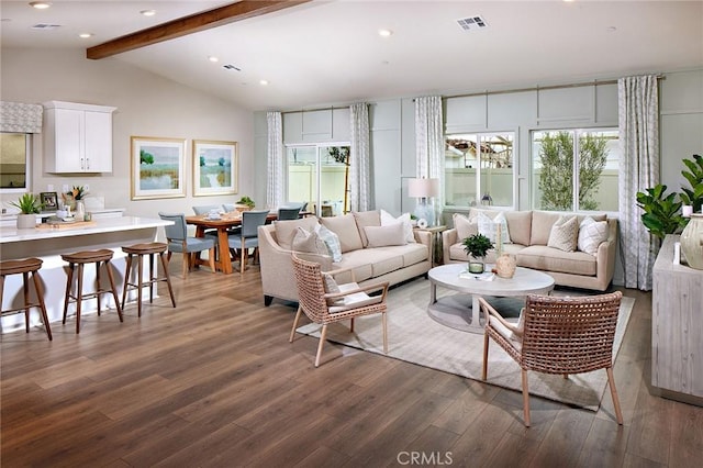 living area featuring lofted ceiling with beams, visible vents, dark wood finished floors, and recessed lighting