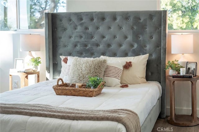 bedroom featuring wood finished floors