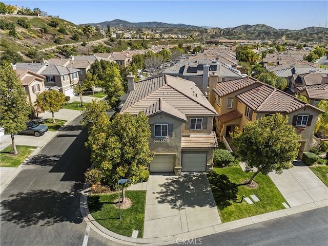 bird's eye view with a mountain view and a residential view