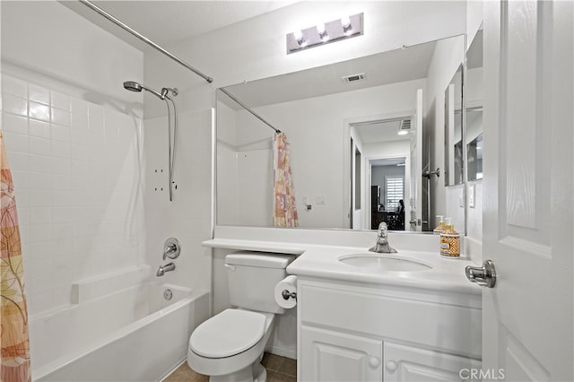 bathroom with toilet, shower / bath combo, visible vents, and vanity