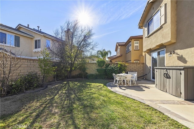 view of yard with a patio area and fence