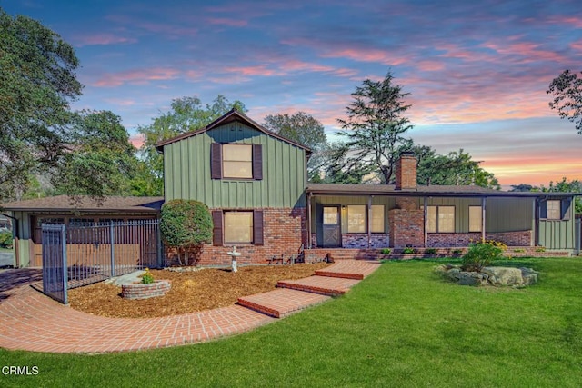 5028 El Adobe Ln, La Crescenta, CA 91214 - tri-level home with brick siding, a chimney, and board and batten siding