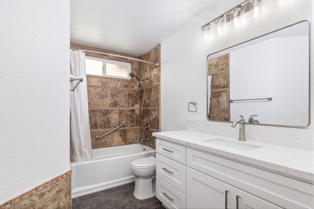 full bathroom featuring toilet, shower / tub combo with curtain, and vanity