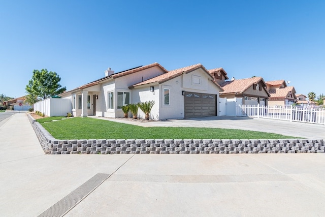 view of front facade with driveway, a residential view, an attached garage, fence, and stucco siding