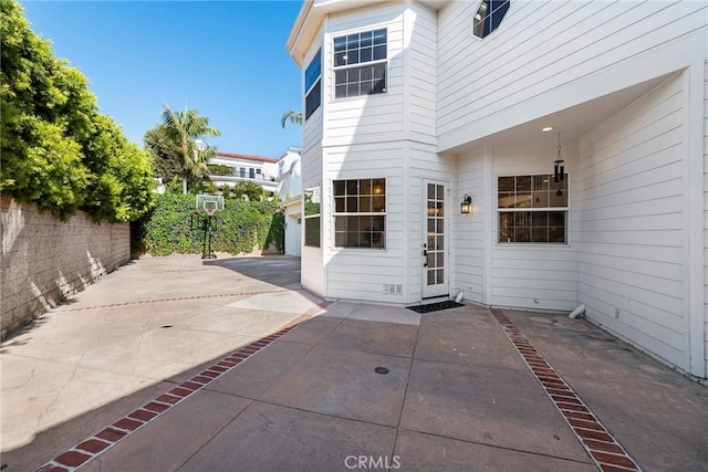 exterior space featuring a fenced backyard