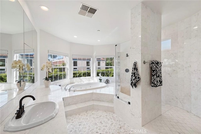 full bathroom featuring recessed lighting, visible vents, a sink, a tub with jets, and walk in shower