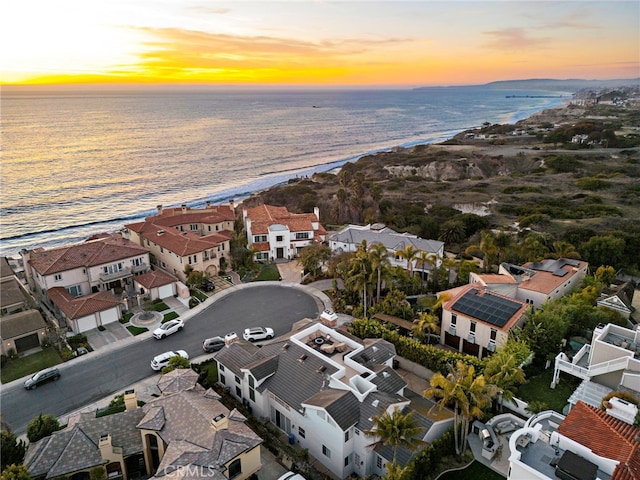 aerial view with a water view and a residential view