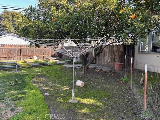 view of yard featuring fence