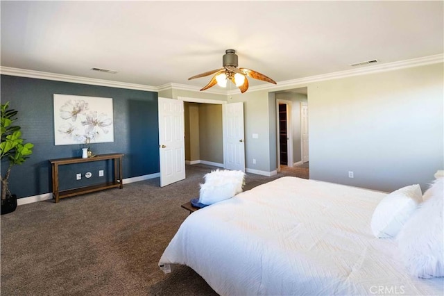 bedroom featuring baseboards, dark colored carpet, visible vents, and crown molding