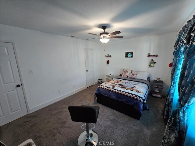 bedroom with ceiling fan, dark carpet, visible vents, and baseboards