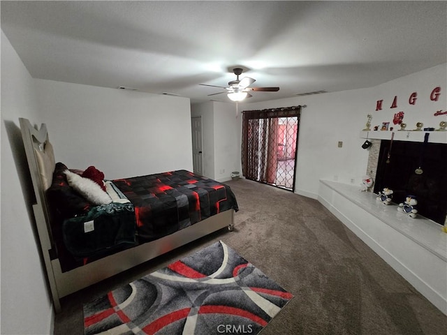 bedroom with a ceiling fan, baseboards, visible vents, and carpet flooring