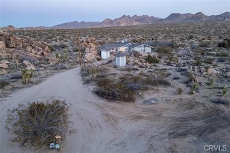 bird's eye view with a mountain view