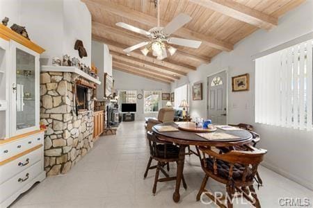 dining room featuring a wealth of natural light, wooden ceiling, and vaulted ceiling with beams