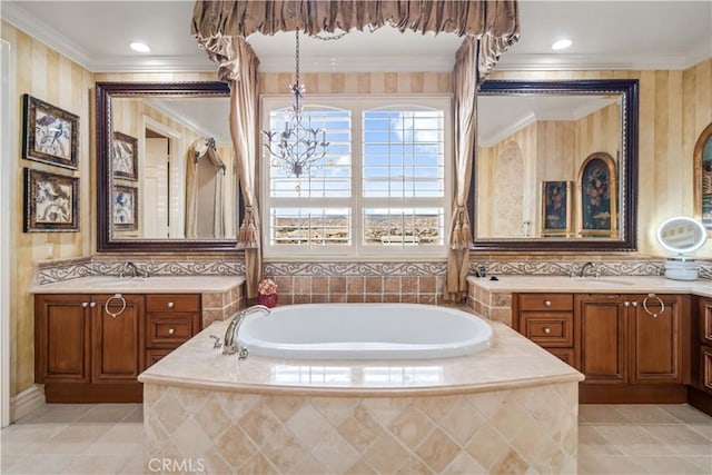 bathroom with tile patterned flooring, two vanities, crown molding, and a bath