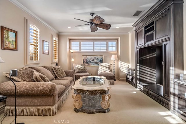 interior space featuring ornamental molding, light carpet, visible vents, and a ceiling fan