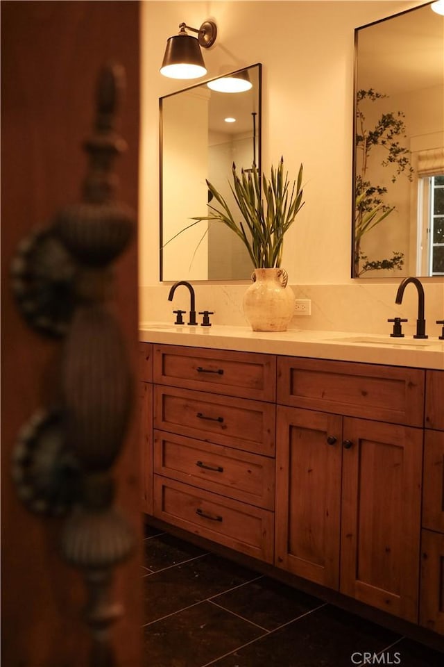 bathroom with double vanity and a sink