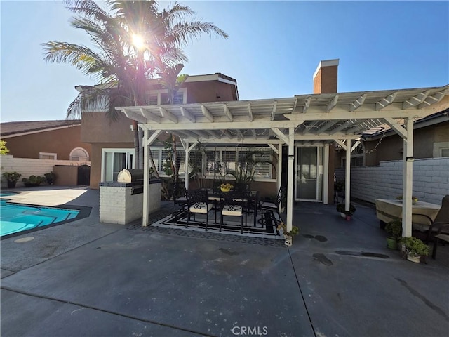 back of property with a patio, area for grilling, fence, and a pergola