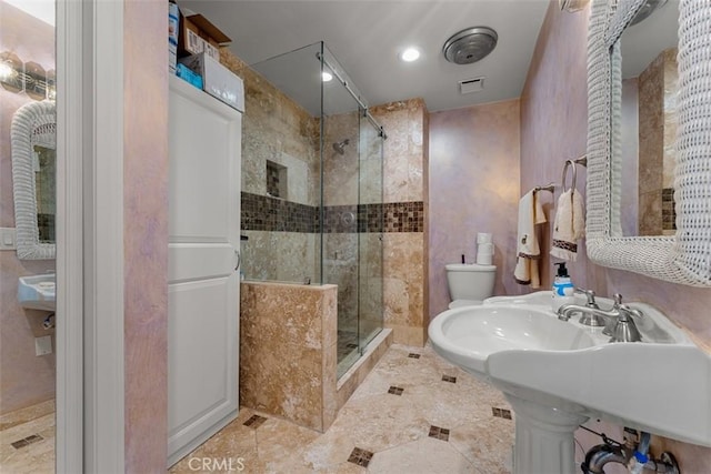 full bath with toilet, a shower stall, visible vents, and tile patterned floors