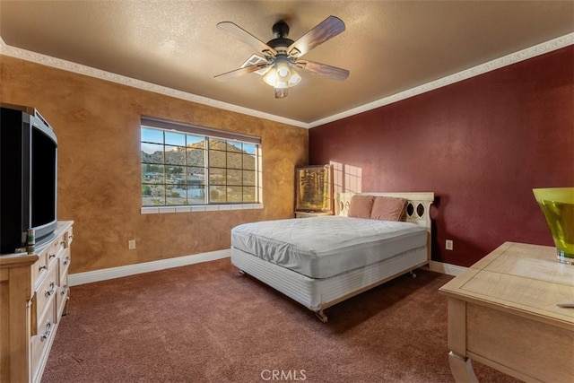 bedroom featuring baseboards, dark colored carpet, a ceiling fan, and ornamental molding