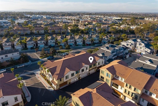 birds eye view of property with a residential view