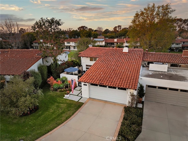 birds eye view of property with a residential view