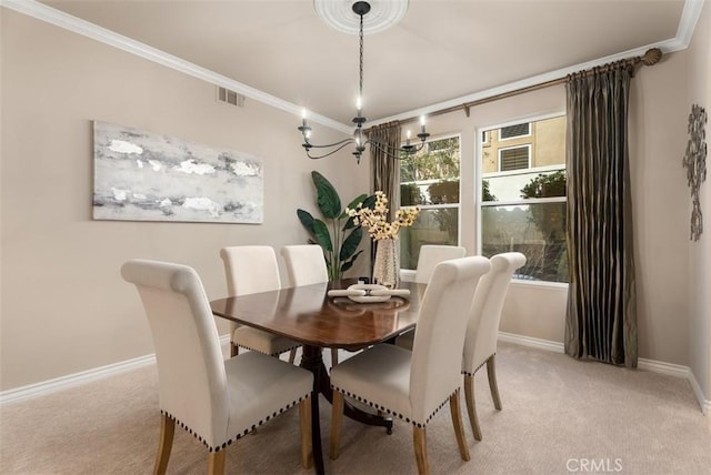 dining area featuring ornamental molding, visible vents, light carpet, and baseboards