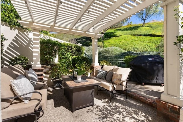 view of patio / terrace featuring a pergola, a grill, and an outdoor hangout area