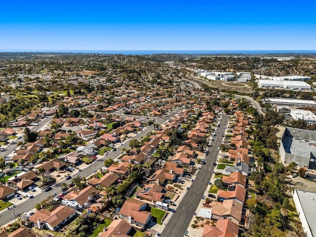 birds eye view of property with a residential view