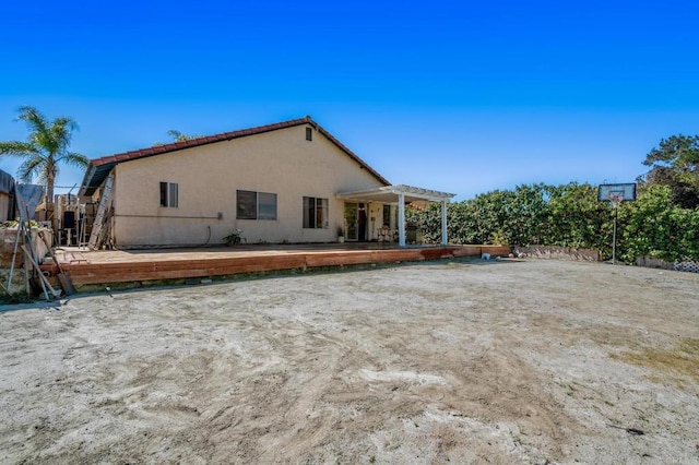 view of property exterior with stucco siding