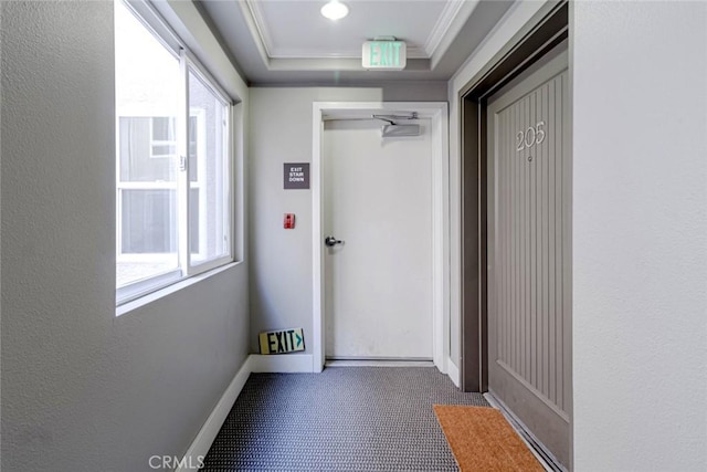 7249 Franklin Ave Unit 205, Hollywood Hills, CA 90046 - hall with crown molding, carpet flooring, baseboards, and a textured wall