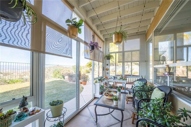 sunroom / solarium with beam ceiling