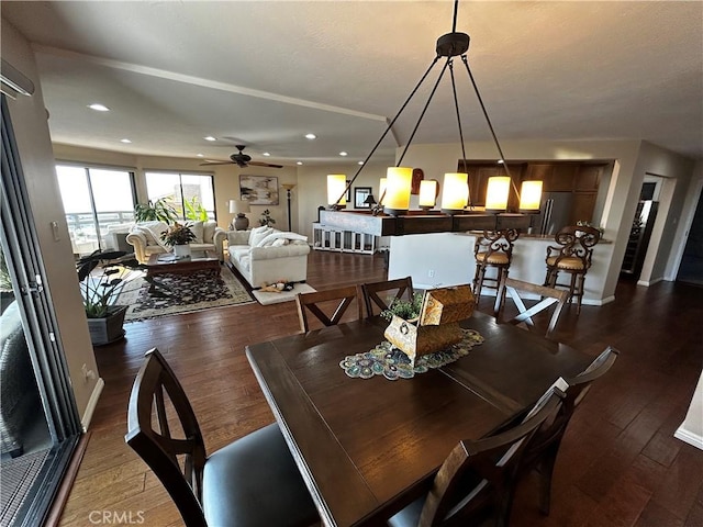 dining space featuring dark wood-type flooring, recessed lighting, baseboards, and a ceiling fan