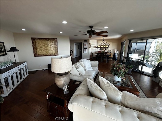 living room with dark wood-style floors, recessed lighting, ceiling fan, and baseboards