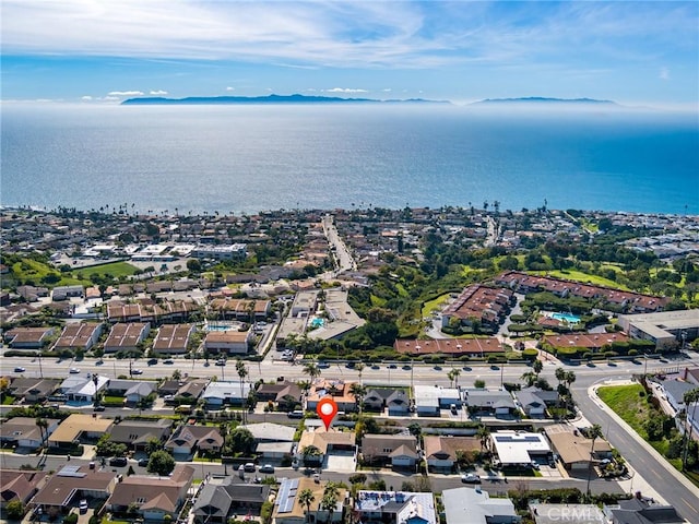 bird's eye view featuring a residential view and a water view