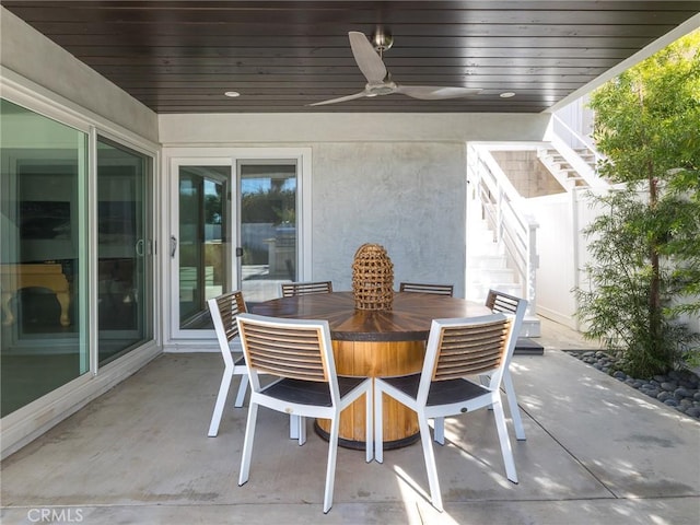 view of patio / terrace featuring outdoor dining space and ceiling fan