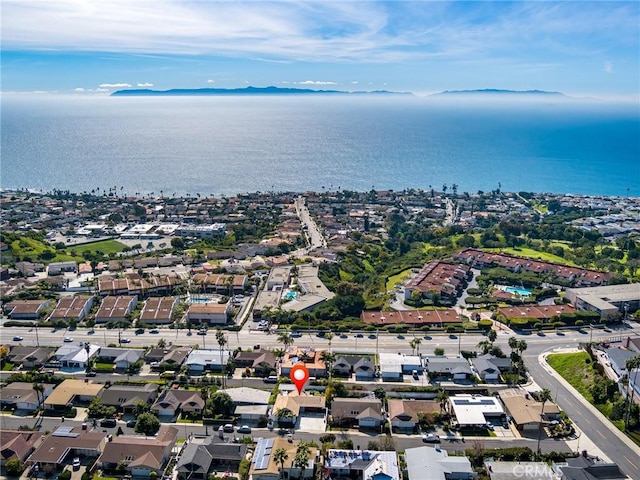 aerial view with a water view and a residential view