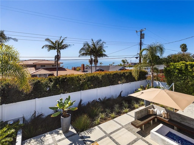 exterior space with a fenced backyard