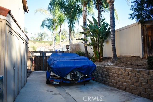 view of parking featuring fence