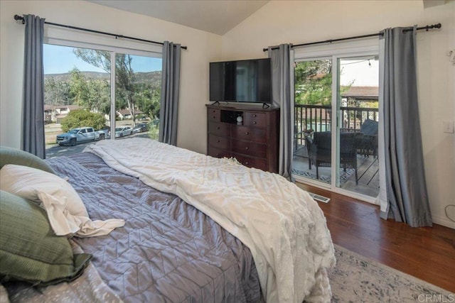 bedroom featuring baseboards, visible vents, dark wood finished floors, access to outside, and vaulted ceiling