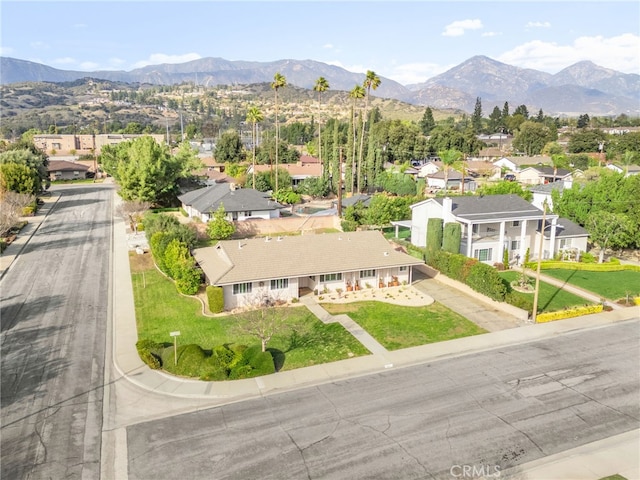 bird's eye view featuring a residential view and a mountain view