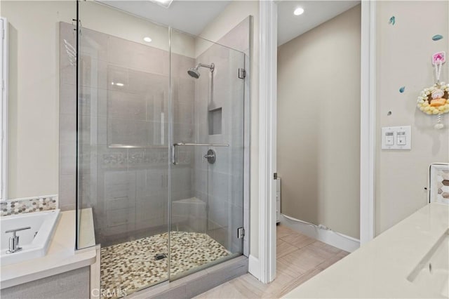 bathroom with a sink, tile patterned flooring, a shower stall, and a bath