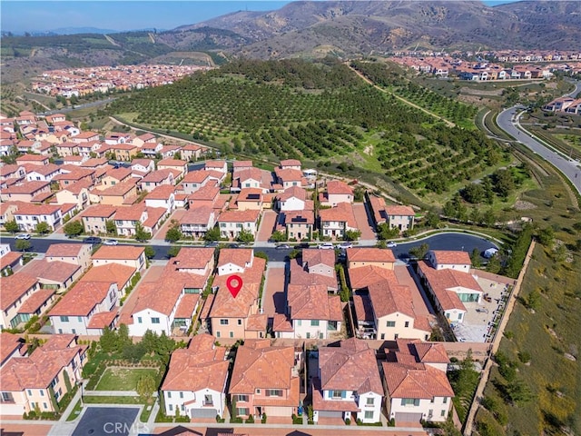 bird's eye view with a residential view and a mountain view