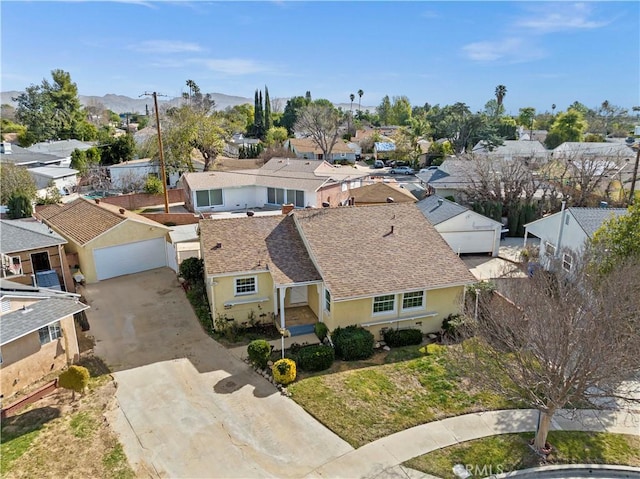 bird's eye view featuring a residential view and a mountain view