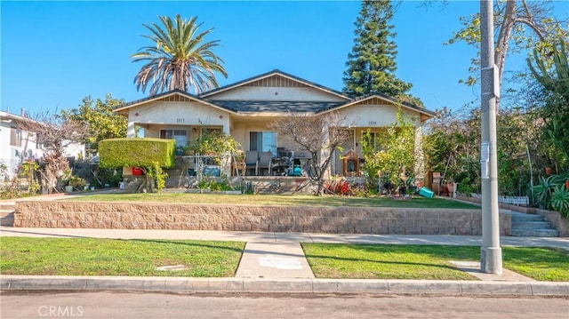 view of front of home with a front yard