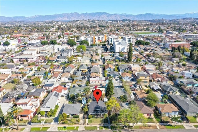 bird's eye view with a residential view and a mountain view