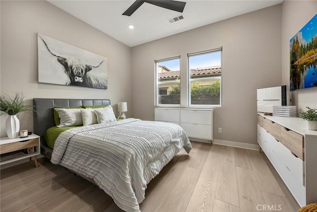 bedroom with light wood finished floors, recessed lighting, visible vents, ceiling fan, and baseboards